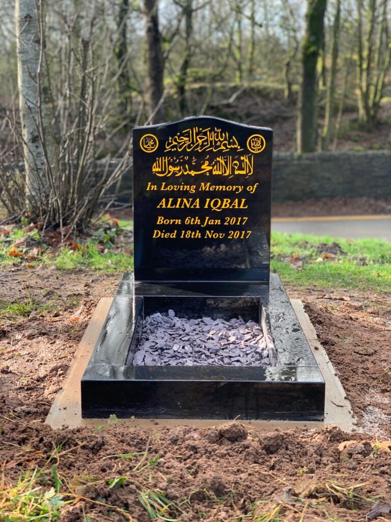 Alina iqbal - small Black ogee with matching kerbs on a slab