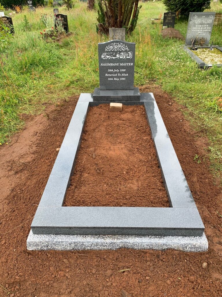 Medium Grey Headstone With Matching Grey Kerbs On Frame Landing