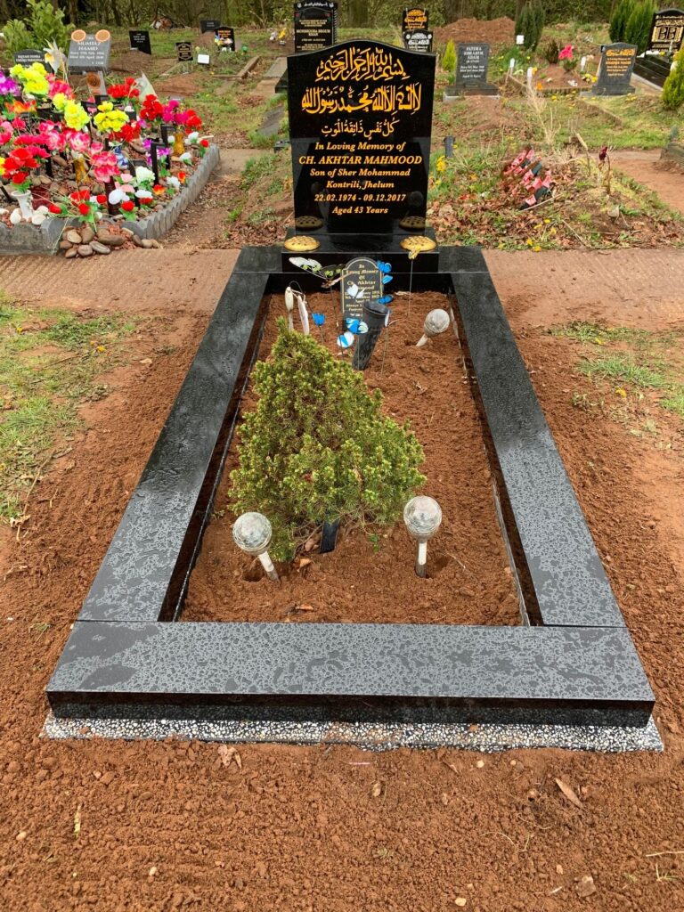 Standard Black Headstone With Matching Black Kerbs On A Frame Landing